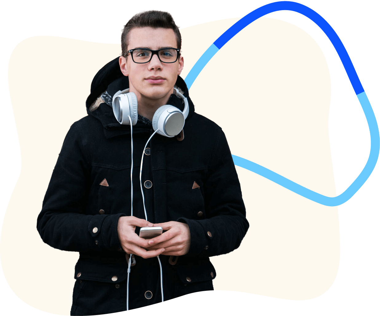 Older teenager with glasses and jacket looking seriously at camera with headphones around his neck