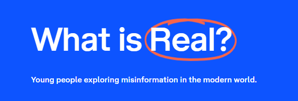 What is real? text on blue background